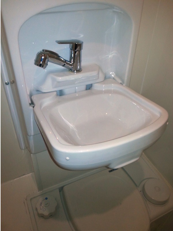 New Foldaway Sink Unit Above Toilet Fitted By Ceide
