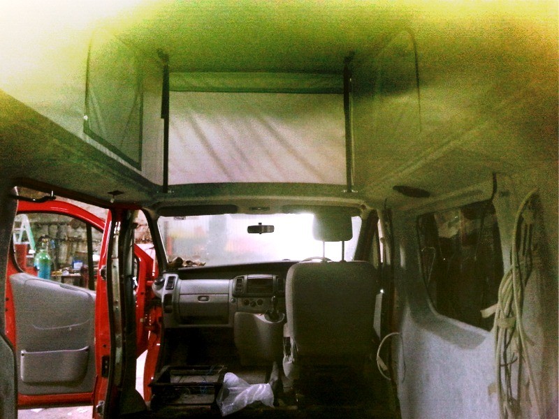 Fitting the elavating roof - view from the inside of van before conversion by Céide Campervan Conversions, Donegal, Ireland