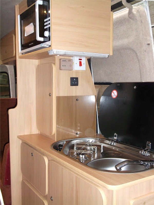 Oven and sink fitted in a camper conversion by Céide Campervan Conversions, Co. Donegal, Ireland