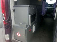 Overview of new campervan showing oven, heater and cupboards from rear of van fitted by Céide Campervan Conversions, Donegal, Ireland